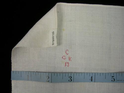 2009 Record shot by L. Baumgarten. Napkin, detail of mark & hem.