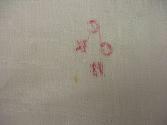 2009 Record shot by L. Baumgarten. Napkin, detail of reverse of mark.
