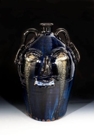 D2010-CMD-033. Burlon Craig face jug.