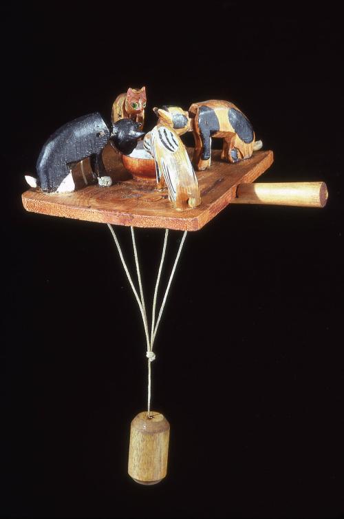 Feeding cats weighted toy