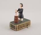 Woman Churning Butter Crank Toy 1979.1200.86