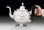 Coffeepot 2015-349 with hand to show scale