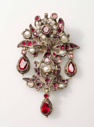 1954-611, Brooch
